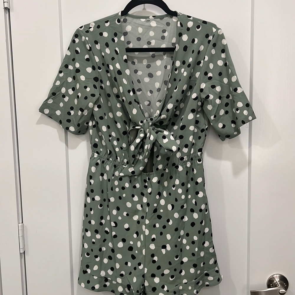 Green polka dot tie top romper.
